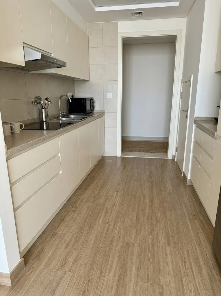 Vinyl plank flooring in a modern apartment kitchen